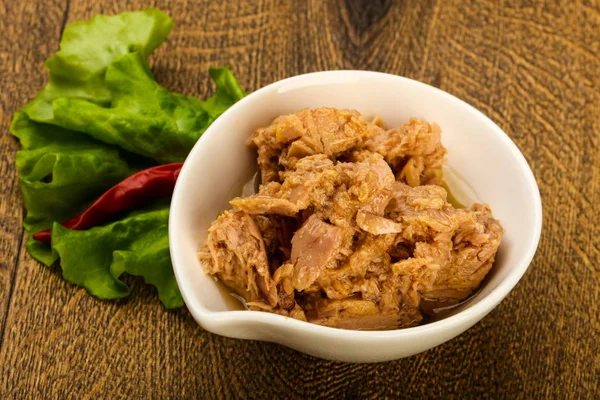 Canned tuna fish in the bowl ready for cooking