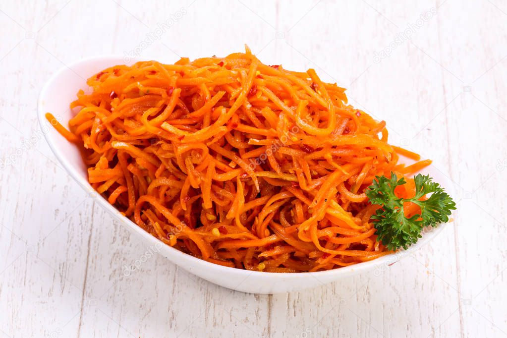 Picked carrot heap in the bowl