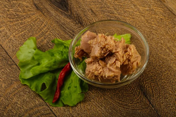 Canned tuna fish in the bowl ready for cooking