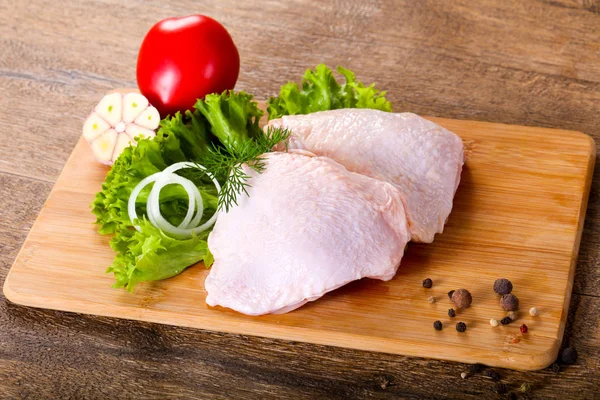 Raw chicken thighs for cooking