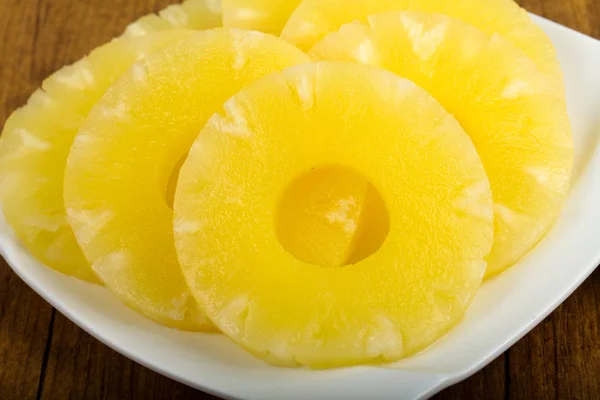 Canned pineapple rings in the bowl