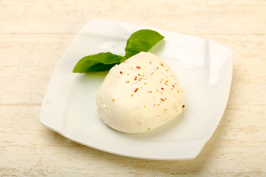 Mozzarella cheese with basil leaves