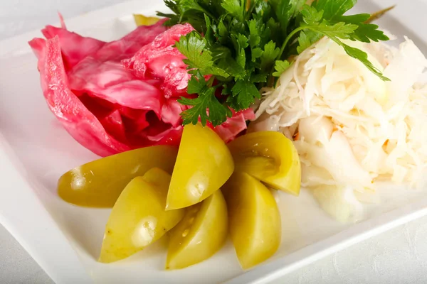Pickled vegetables - tomato, cucumbers and cabbage — Stock Image Pickled Vegetables Tomato Cucumbers Cabbage Royalty Free Stock Images