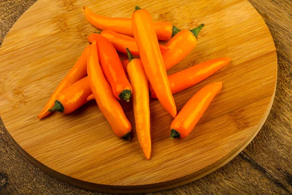 Hot Yellow Pepper Heap Wooden Background — Stock Photo, Image