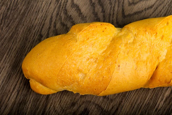 Baget Ekmek Ahşap Arka Plan Üzerine — Stok fotoğraf