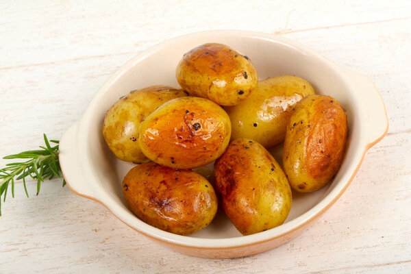 Young baked potato with rosemary