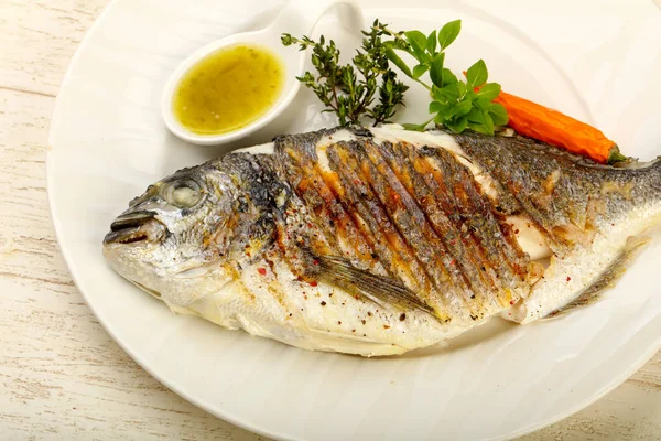 Grilled dorado fish with sauce, thyme and basil — Stock Image Grilled Dorado Fish Sauce Thyme Basil Royalty Free Stock Images