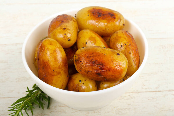 Young baked potato with rosemary