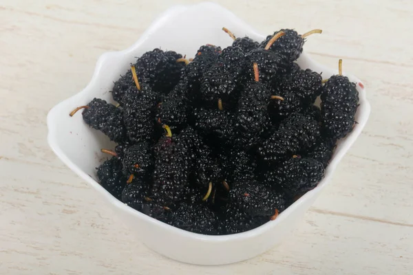 Black Mulberries heap over wooden background — Stock Image Black Mulberries Heap Wooden Background Stock Image