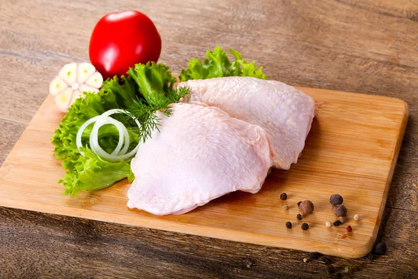 Raw chicken thighs for cooking