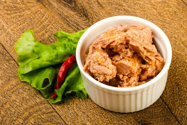 Canned tuna fish in the bowl ready for cooking