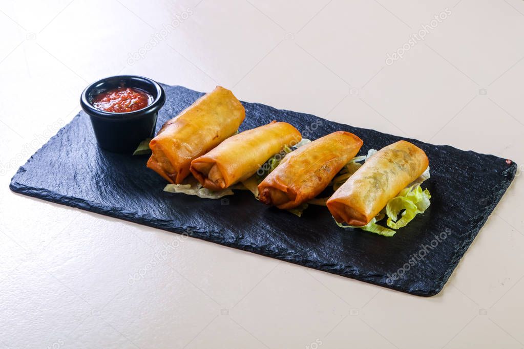 Spring roll with tomato sauce 