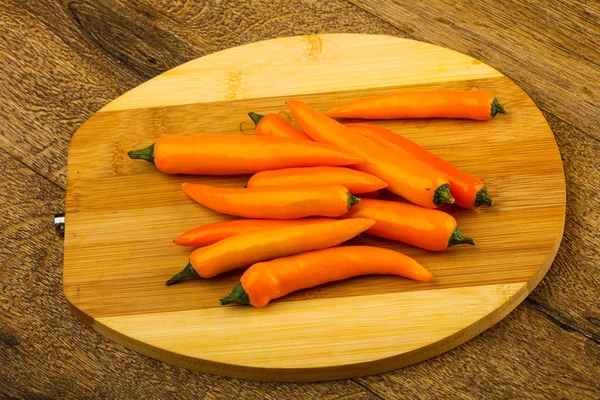 Hot Yellow Pepper Heap Wooden Background — Stock Photo, Image