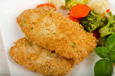 Susam ve haşlanmış sebzeler ile tavuk