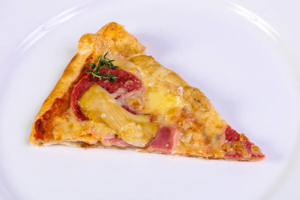 Tasty Pizza with ham and sausages