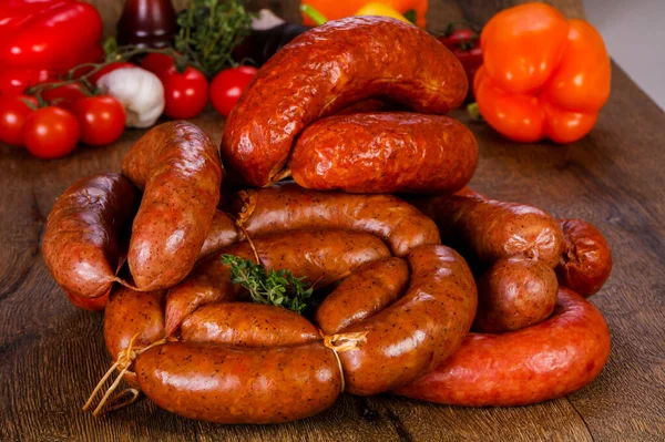 Pork sausages over wooden — Stock Photo, Image