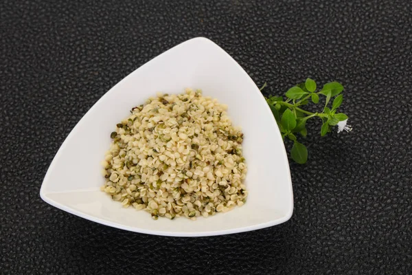 Peeled hemp seeds in the bowl — Stock Photo, Image