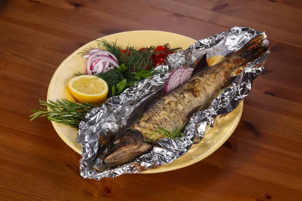 Stuffed baked pike with lemon — Stock Image Stuffed baked pike with lemon Stock Photo