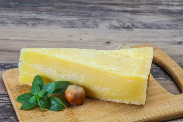 Parmesan cheese served basil and nuts — Stock Photo, Image