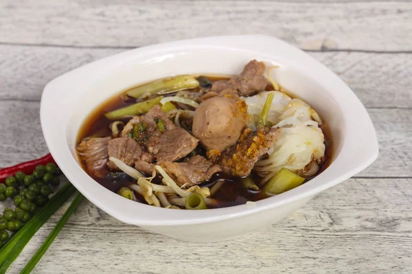 Thai style soup with meat and mushrooms — Stock Photo, Image