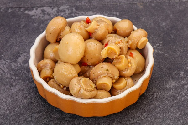 Pickled champignons in the bowl — Stockfoto