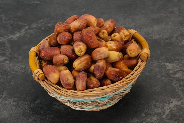 Sweet tasty dry dates in the basket — Stock Photo, Image