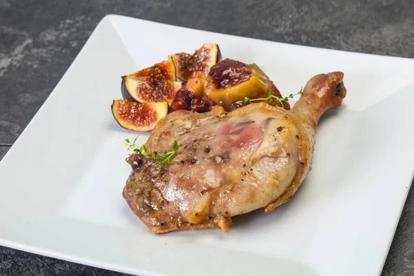 Roasted. duck. leg with plum and apple — Stock Photo, Image