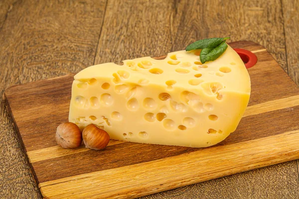 Maasdam cheese - yellow triangle with holes — Stok fotoğraf