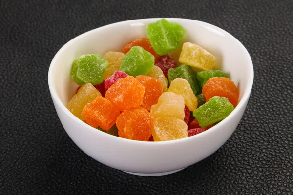 Sweet candied fruit heap in the bowl