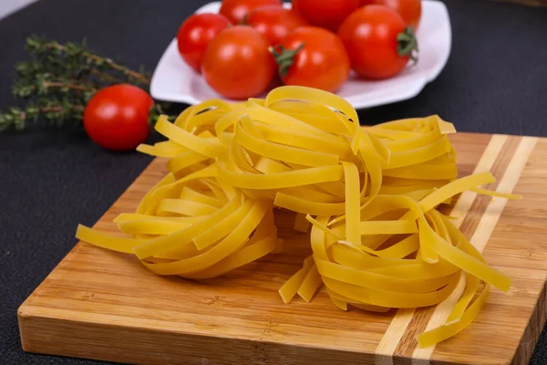 Raw Pasta Fettuccini Tomatoes Thyme — Stock Photo, Image