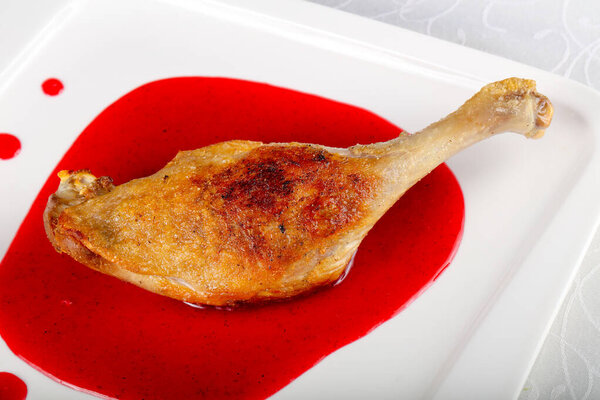 Duck leg in berry sauce