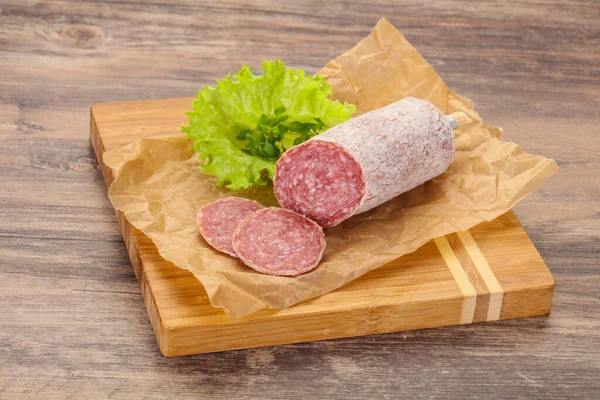 Italian Dry Saliami Pork Sausage Served Salad Leaves — Stock Photo, Image