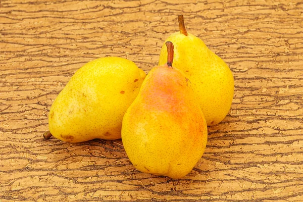 Fresh sweet yellow pear over background