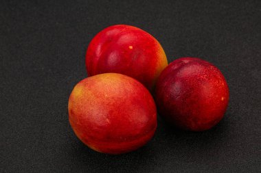 Tatlı olgun ve lezzetli Nectarine arka planda