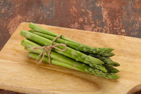 Raw Asparagus Heap Wooden Board — Stock Photo, Image