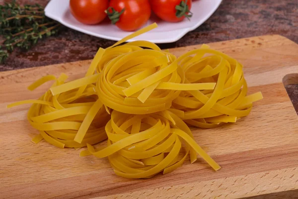 Raw Pasta Fettuccini Tomatoes Thyme — Stock Photo, Image