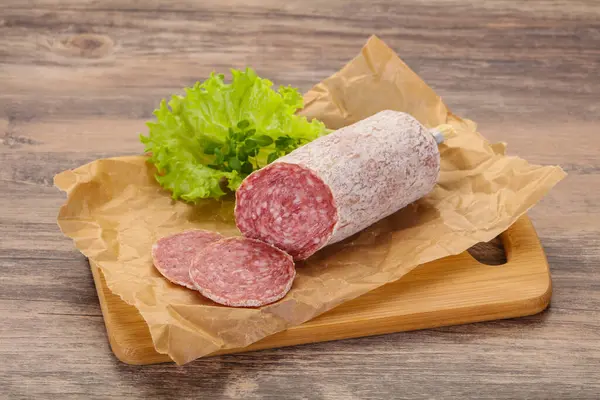 Italian Dry Saliami Pork Sausage Served Salad Leaves — Stock Photo, Image