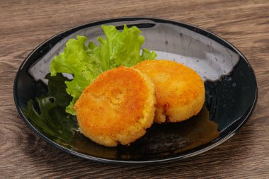 Vejetaryen mutfağı - Tabakta kızarmış patates pirzolası