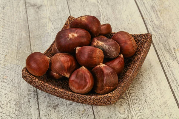 Pedaço Castanha Tigela Sobre Fundo Madeira — Fotografia de Stock