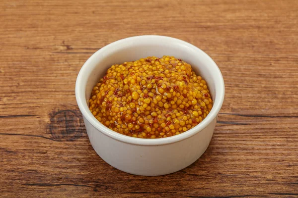 Dijon mustard sauce with seeds in the bowl