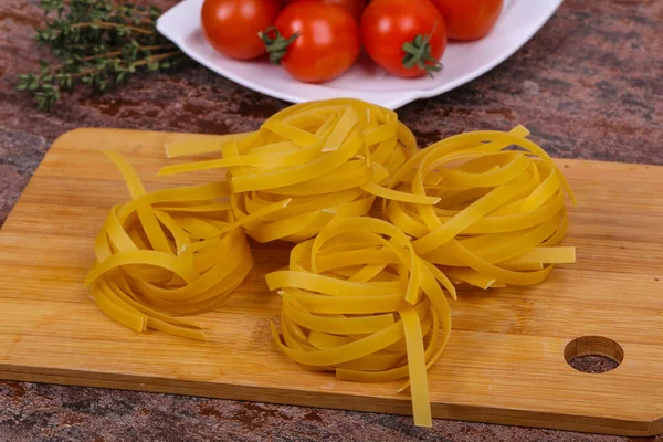 Raw Pasta Fettuccini Tomatoes Thyme — Stock Photo, Image