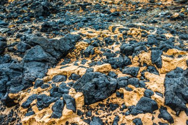 stones from hardened volcanic lava clipart