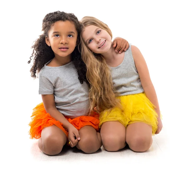 Two little girls with different complexion — Stock Photo, Image