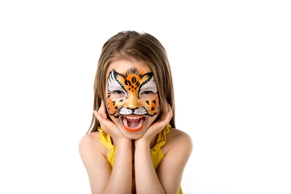 Cute little girl with painted face — Stock Photo, Image