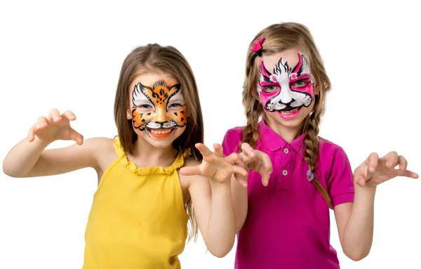 Two little girls with painted faces — Stock Photo, Image