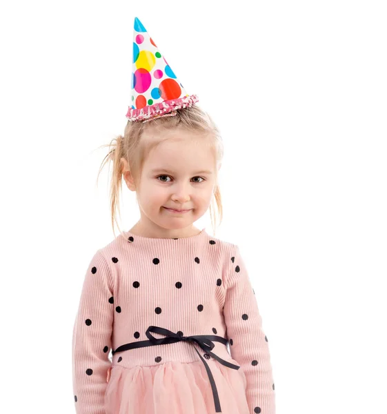 Menina no aniversário chapéu colorido hasher, isolado — Fotografia de Stock