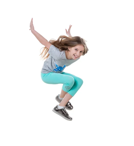 Menina ativa de cabelos longos dançando, isolado — Fotografia de Stock