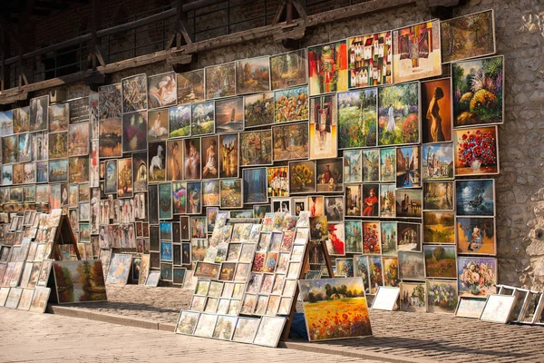 Pictures on display on street of Krakow — Stock Photo, Image