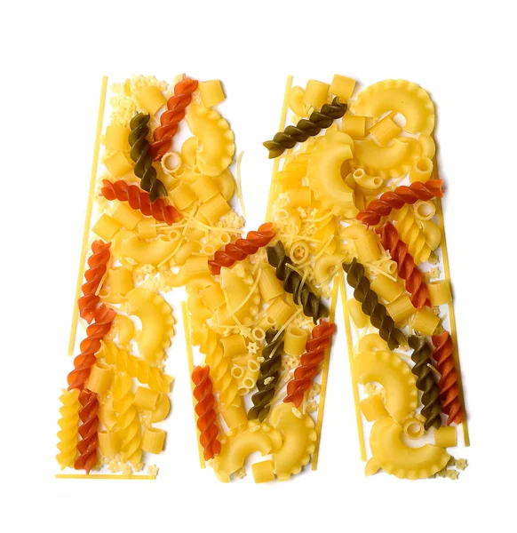 Pile of spaghetti forming a letter M — Stock Photo, Image