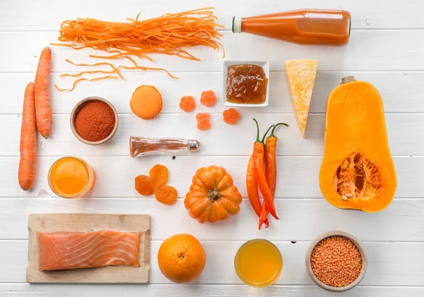 Conjunto de objetos naranja, calabaza y zanahorias, vista superior — Foto de Stock